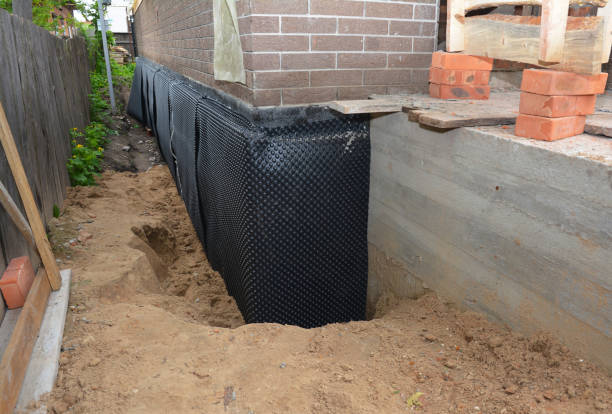 SJ Waterproofing Pros technician performing targeted Emergency Waterproofing assessment in Jericho, NY